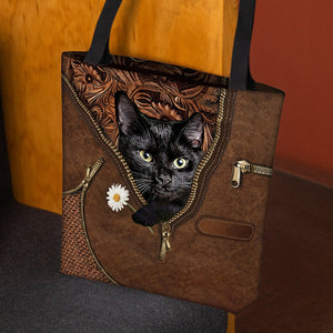 Black Cat Holding Daisy Tote Bag