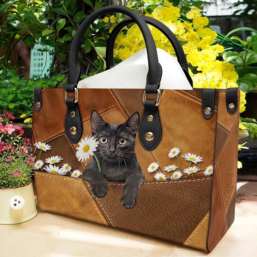 Black Cat Holding Daisy Leather Bag