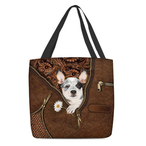 Heeler Holding Daisy Tote Bag