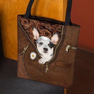 Heeler Holding Daisy Tote Bag