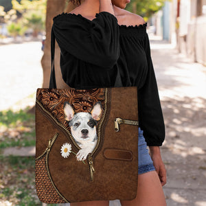 Heeler Holding Daisy Tote Bag